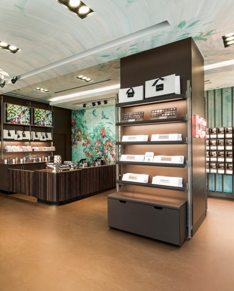 Lit product shelves at Hotel Chocolat