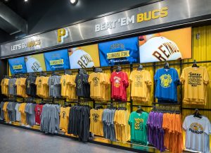 Pittsburgh Pirates colorful apparel on wall unit