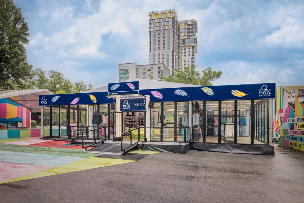 Outside view of popup retail building with glass walls