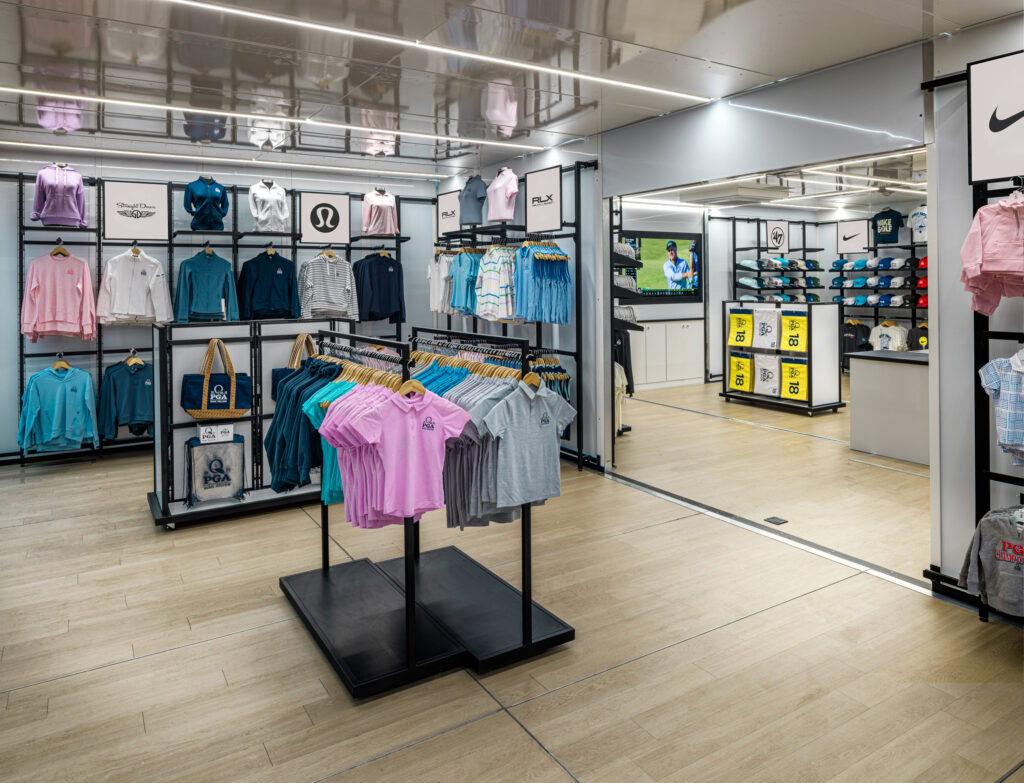 indoor view of popup store with freestanding shirt racks