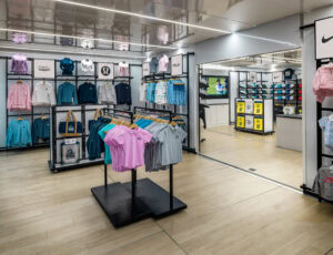 indoor view of popup store with freestanding shirt racks