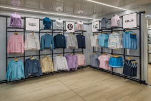 corner shirt wall racks in popup store