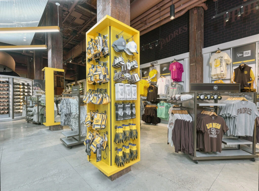 tall yellow freestanding accessory gondola with Padres merchandise