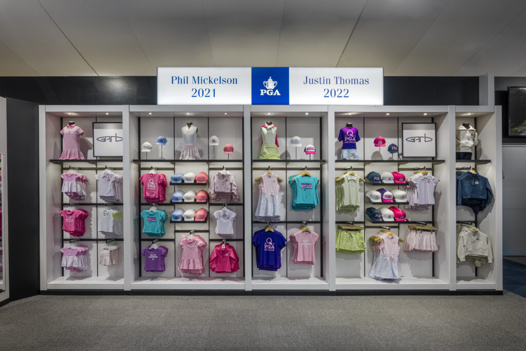 kids apparel wall rack with PGA merchandise