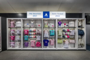 kids apparel wall rack with PGA merchandise