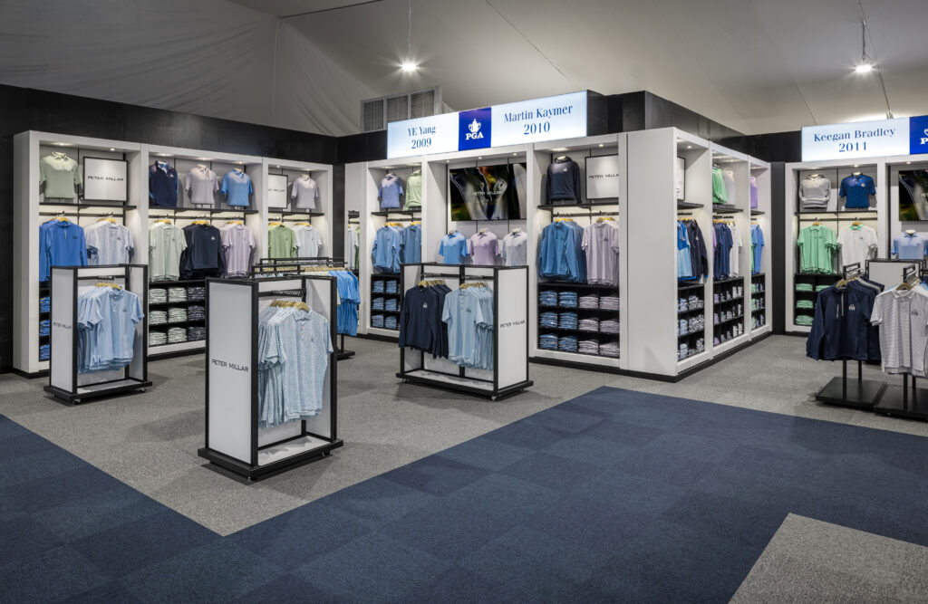 large tent corner fixtures with freestanding clothing racks