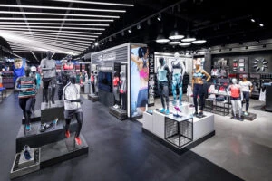 apparel and footwear floor fixtures with display lighting
