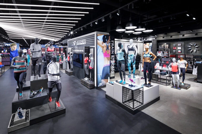 apparel and footwear floor fixtures with display lighting