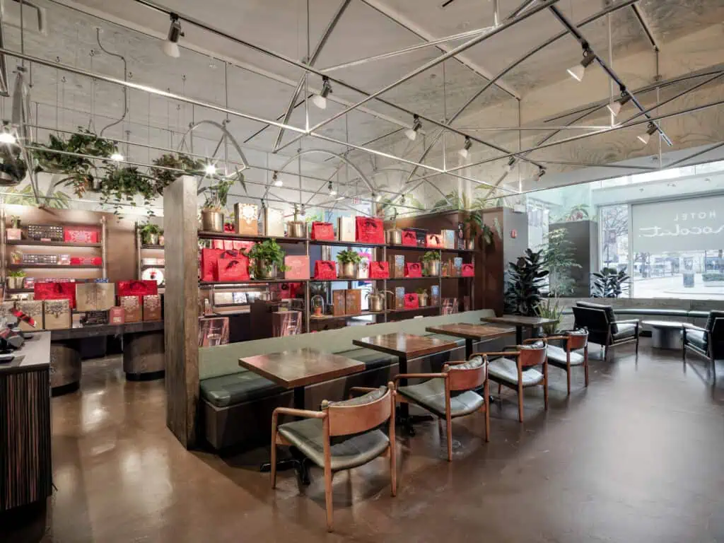 Hotel Chocolat seating area with benches and chairs