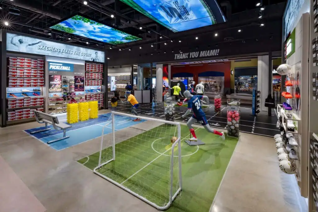 Soccer field display for shoe retail in store