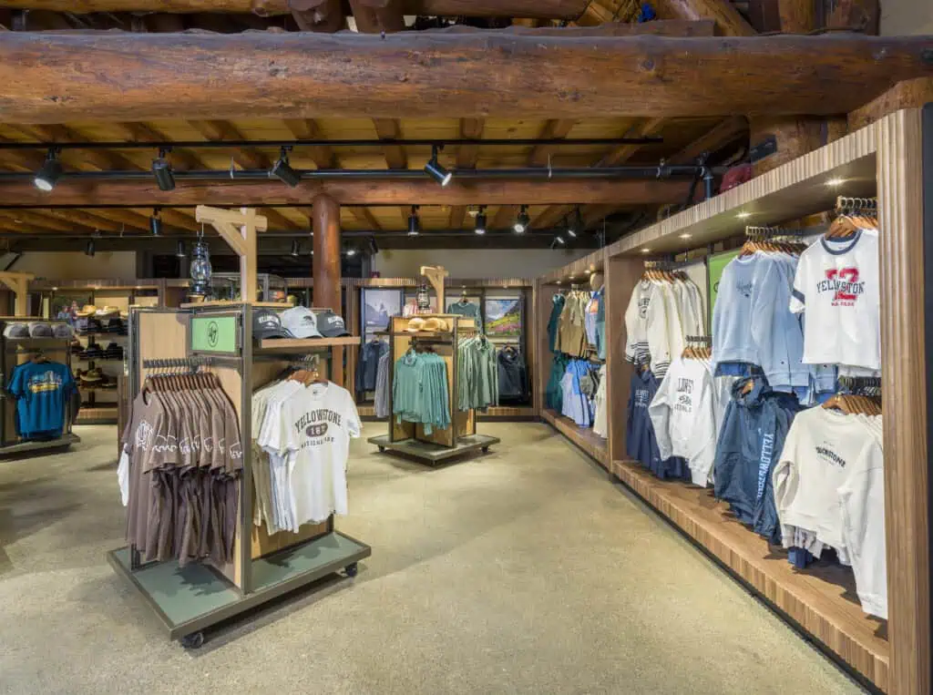 apparel racks in log cabin themed store