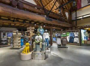 Wide shot of log cabin themed store with floor and wall fixtures